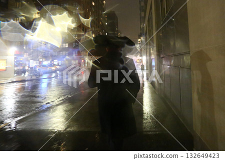 cityscape scene with water raining and color lights cityscape scene with water raining and color lights 132649423
