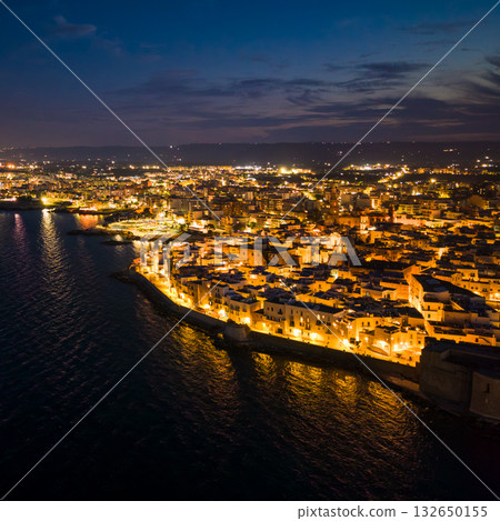 Aerial view of the old town of Monopoli in the Apulia region of Italy at night 132650155