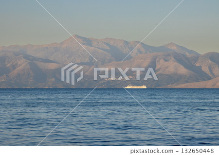 Ionian sea and Albanian mountains, Corfu, Greece 132650448