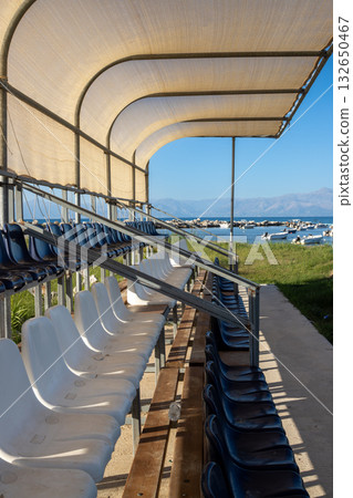 Empty tribune of a football stadium, Corfu (Korfu), Greece Empty tribune of a football stadium, Corfu (Korfu), Greece 132650467