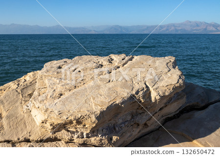 Detail of natural boulders - breakwaters, Greece 132650472