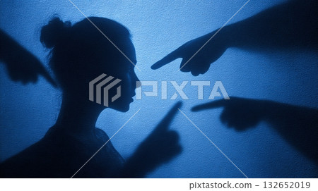 Emotional Judgment Concept: Woman's Profile with Pointing Fingers in Blue Tone 132652019