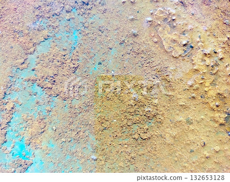 Rust Accumulation on Metal Surface With Water Layer Reflecting Vibrant Colors in Natural Light Rust Accumulation on Metal Surface With Water Layer Reflecting Vibrant Colors in Natural Light 132653128