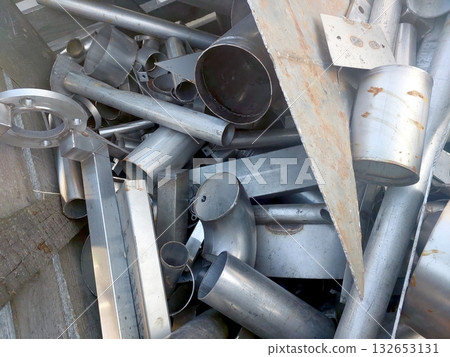 Stainless Steel Scrap Gathered in a Pile at an Industrial Recycling Facility Stainless Steel Scrap Gathered in a Pile at an Industrial Recycling Facility 132653131
