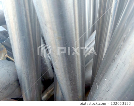 Stainless Steel Scrap Piled Together in a Recycling Yard During Daylight Hours 132653133