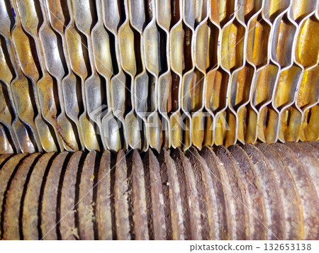 Detailed View of an Industrial Plate Heat Exchanger With Tight Plate Pack Assembly 132653138