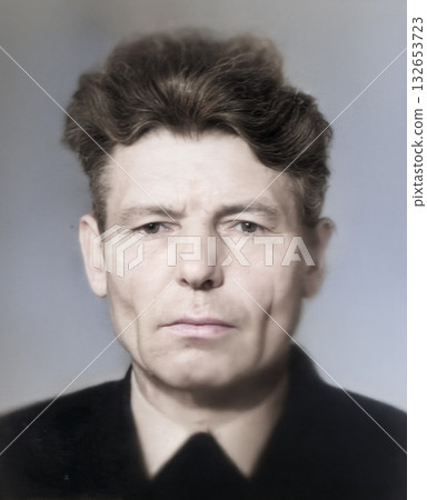 A vintage portrait of a serious, thoughtful elderly man with gray hair. Retro photo from 1990. 132653723