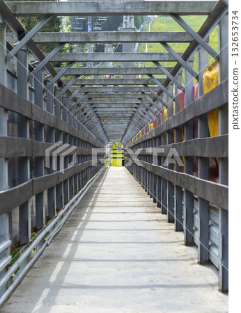 perspective view of a corridor made of planks outdoor perspective view of a corridor made of planks outdoor 132653734