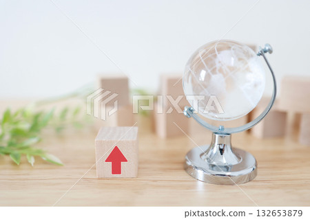 Global upward trend indicated by globe and upward arrow. Global upward trend indicated by globe and upward arrow. 132653879