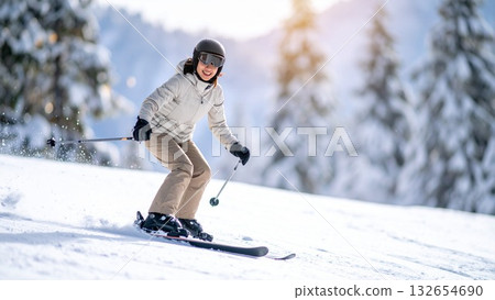 A young Japanese woman with short bob hair enjoying skiing on a snowy mountain A young Japanese woman with short bob hair enjoying skiing on a snowy mountain 132654690