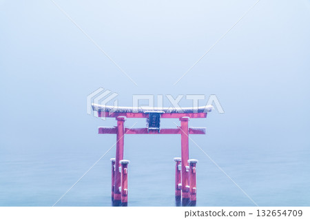 Shiga Shirahige Shrine: Large torii gate in the lake in the snow Shiga Shirahige Shrine: Large torii gate in the lake in the snow 132654709