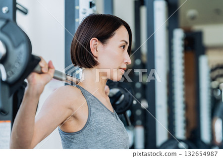 A middle-aged woman working out at the gym. Photo courtesy of Sports Club & Sauna Spa Renaissance Makuhari 24 132654987