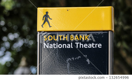 Pedestrian sign pointing to South Bank and National Theatre in London 132654996
