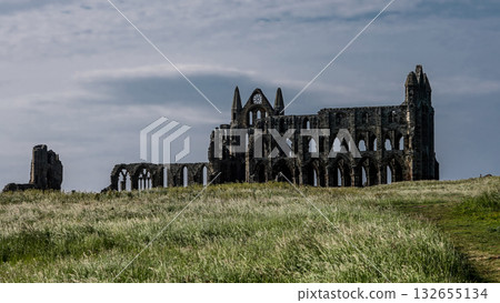 Whitby Abbey rising over North York Moors National Park in England 132655134