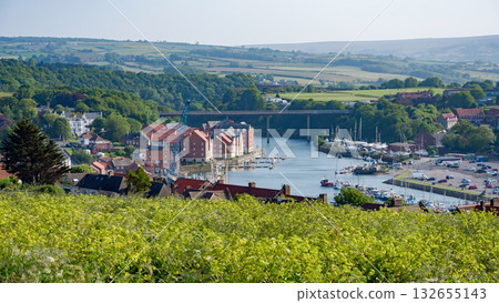 Whitby harbor and swing bridge connecting the town with surrounding countryside in North York Moors National Park 132655143