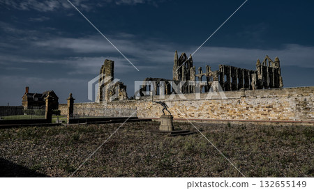 Whitby Abbey dominating the landscape in North York Moors National Park, UK 132655149