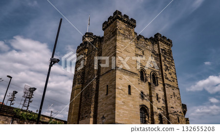 Newcastle Castle keep rising towards a cloudy sky in Newcastle, UK 132655208