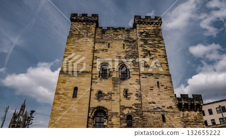 Newcastle Castle keep rising towards a cloudy sky in Newcastle, UK 132655222