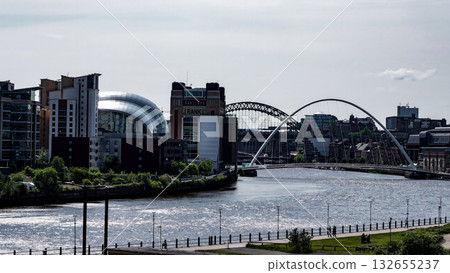 Newcastle Quayside showcasing the iconic Tyne Bridge and Sage Gateshead music venue 132655237