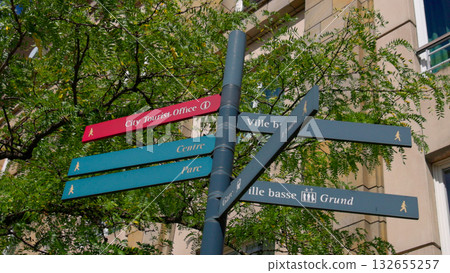 Directional signs pointing to city center, park, tourist office and Grund district in Luxembourg City Directional signs pointing to city center, park, tourist office and Grund district in Luxembourg City 132655257