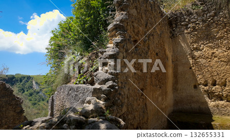 Ancient ruins of a settlement revealing the past in Zungri, Calabria, Italy Ancient ruins of a settlement revealing the past in Zungri, Calabria, Italy 132655331