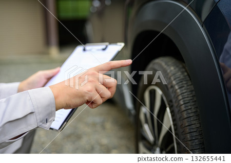 Male worker making an estimate Male worker making an estimate 132655441