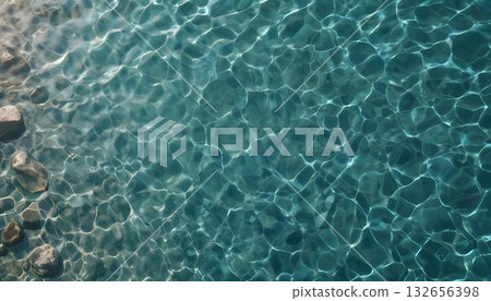 A coastal view of rocks and ocean water in summer, emphasizing the textures of nature's elements A coastal view of rocks and ocean water in summer, emphasizing the textures of nature's elements 132656398