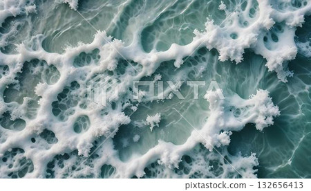 Close view of ocean waves in summer, focusing on their texture with a subtle background 132656413