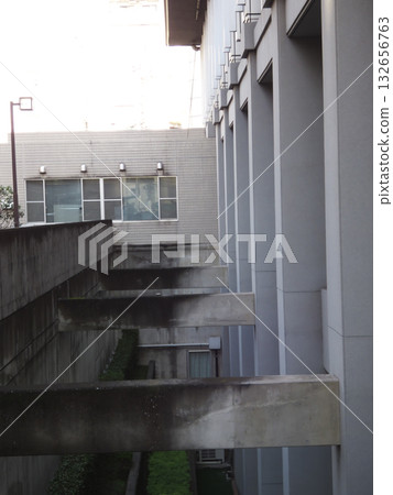 Concrete structures and deep shadows between buildings in the city Concrete structures and deep shadows between buildings in the city 132656763