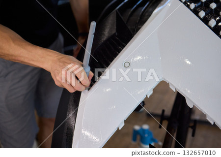 Applying a Protective Film on the Surface of Your Car for Enhanced Durability and Shine Applying a Protective Film on the Surface of Your Car for Enhanced Durability and Shine 132657010