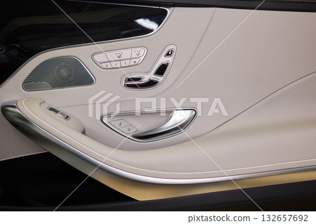 A car door with trim showcasing automotive design details A car door with trim showcasing automotive design details 132657692