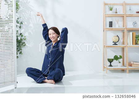 A woman in pajamas who woke up in the morning 132658046