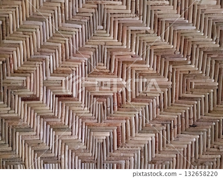 Handcrafted Rattan Weave Background with Concentric Geometric Pattern Handcrafted Rattan Weave Background with Concentric Geometric Pattern 132658220