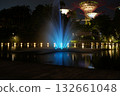 nighttime Supertree Grove Gardens by the Bay blue fountain glowing lights 132661048