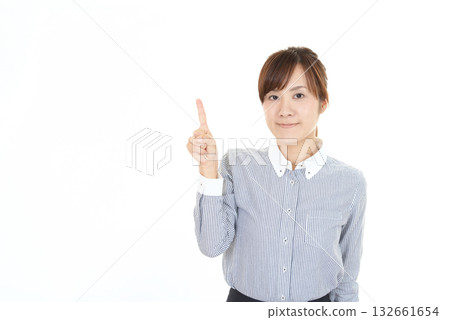 A woman pointing to space A woman pointing to space 132661654