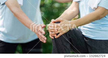 Wellness and Senior Care. A senior receiving guidance during a gentle exercise session. Wellness and Senior Care. A senior receiving guidance during a gentle exercise session. 132662724