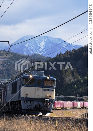 Mount Ena and freight trains in winter 132664148