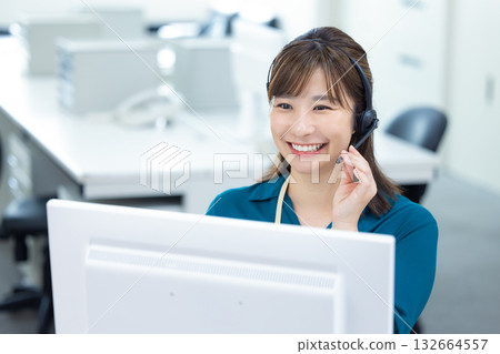 Business woman wearing an intercom 132664557