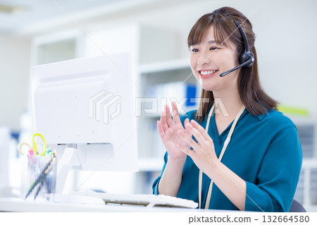 Business woman wearing an intercom Business woman wearing an intercom 132664580