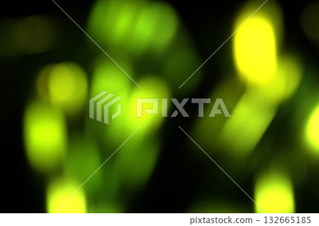 Green Lemon Glare on Matte Black Grainy Background 132665185