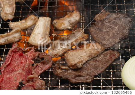 Enjoy a barbecue with family and friends Enjoy a barbecue with family and friends 132665496