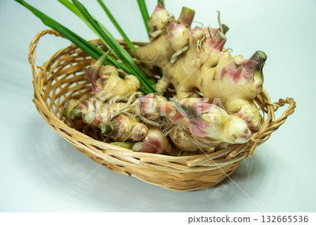Ginger with leaves in a basket 132665536