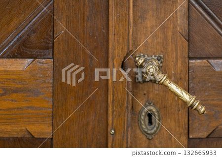 Elegant Wooden Door with Antique Brass Handle and Keyhole design, ideal for any entryway Elegant Wooden Door with Antique Brass Handle and Keyhole design, ideal for any entryway 132665933