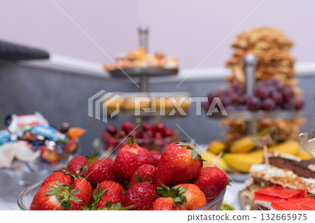 A Beautiful and Delicious Fruit and Pastry Display Perfect for Any Event or Celebration 132665975