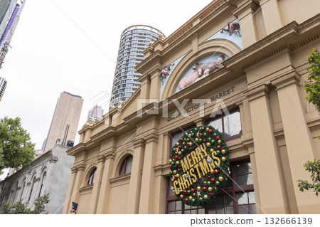 Melbourne, Australia - December 28,2023 : Unidentified people at the entrance of Queen Victoria Market in Melbourne, Australia on December 28,2023. Melbourne, Australia - December 28,2023 : Unidentified people at the entrance of Queen Victoria Market in Melbourne, Australia on December 28,2023. 132666139