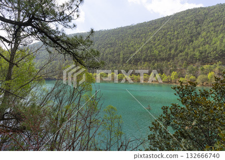 Beautiful view of Blue Moon Valley lake in Lijiang, China. Beautiful view of Blue Moon Valley lake in Lijiang, China. 132666740