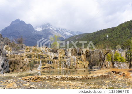 Lijiang, China - April 10, 2024 : Crowd of tourist travel at Blue Moon Valley lake in Lijiang, China on April 10, 2024. Lijiang, China - April 10, 2024 : Crowd of tourist travel at Blue Moon Valley lake in Lijiang, China on April 10, 2024. 132666778