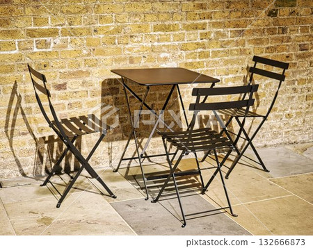 Table and chairs 132666873