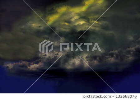 Dark storm clouds gathering and moving across sky 132668070