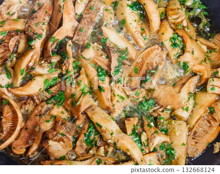 Sauteed Wild Mushrooms with Garlic and Parsley in Olive Oil 132668124